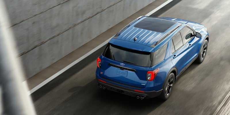 top view of Ford Explorer Hybrid driving on road