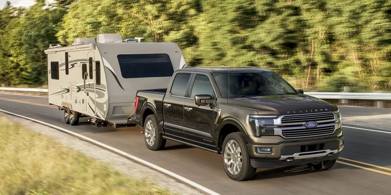 Ford F-150 is towing.