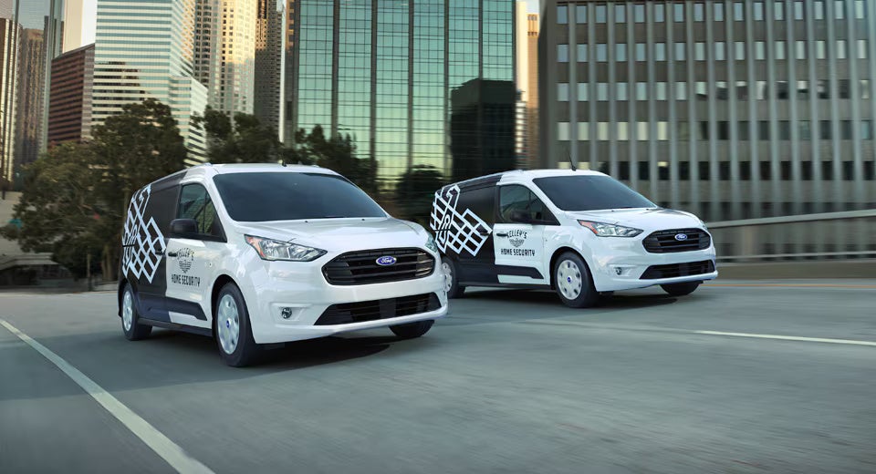 Two cars are moving on road.